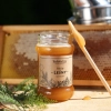 miod-lesny-370g-skarby-roztocza-konsystencja-lyzeczka-produktowe-front-kwadrat.webp