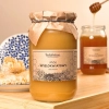 miod-wielokwiatowy-1000g-skarby-roztocza-front-kwadrat-produktowe.webp