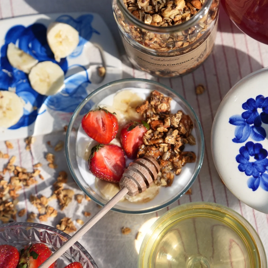 treasures of roztocze granola with pollen square yoghurt breakfast honey dipper strawberries fruit